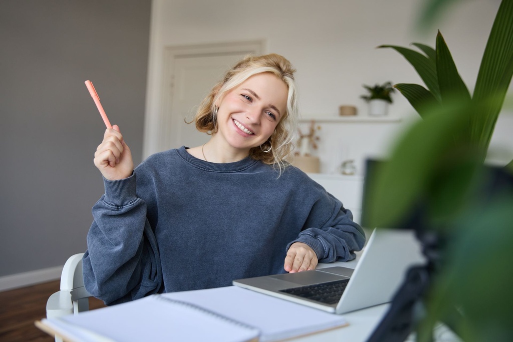 portrait-young-smiling-woman-student-talking-teacher-online-via-video-chat-doing-course.jpg